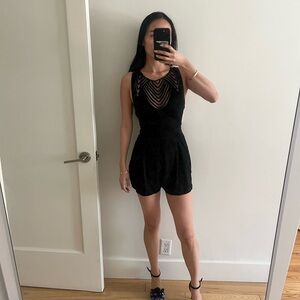 Black LF Sleeveless Romper with Mesh Neckline From Seek the Label